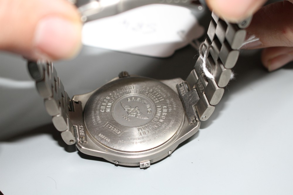 A gentlemans steel Breitling Aerospace quartz wrist watch, on Breitling bracelet.